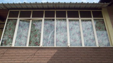 Trasformare un balcone o un terrazzino in veranda? Serve il permesso di costruire